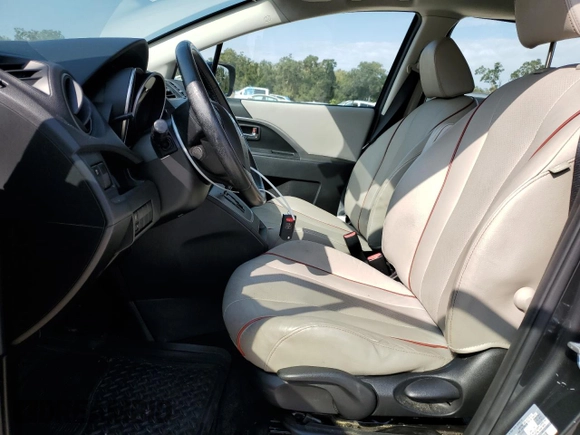 2012 Mazda 5 Grand Touring with VIN JM1CW2DLXC0128553, listed as a Copart auction lot 75610954 with 143,462 mi miles and Salvage Title. Bid and sale history available at DreamBid. Image 7.