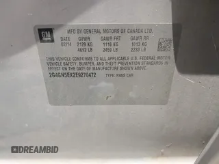 2014 Buick Regal Premium I with VIN 2G4GN5EX2E9270472, listed as a IAAI auction lot 42591013 with Not provided miles and . Bid and sale history available at DreamBid. Image 9.