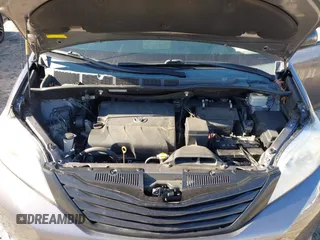 2014 Toyota Sienna L with VIN 5TDZK3DC3ES506658, listed as a IAAI auction lot 41469391 with 169,848 mi miles. Bid and sale history available at carsss.com. Image 10.