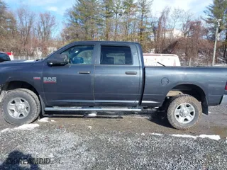 2014 Ram 2500 Tradesman with VIN 3C6TR5CT4EG189929, listed as a IAAI auction lot 41534516 with 148,120 mi miles. Bid and sale history available at carsss.com. Image 14.