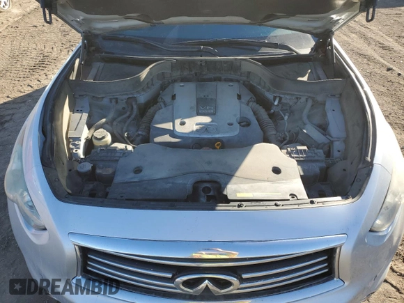 2015 Infiniti QX70 z VIN JN8CS1MW6FM483141, wystawiony jako Copart lot #44126235 z przebiegiem 174 034 mil mil oraz Czysty tytuł • Clean title. Historia ofert i sprzedaży dostępna na DreamBid. Obrazek 12.