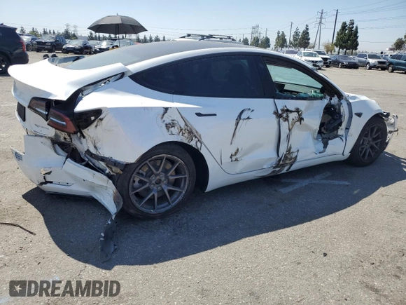 2021 Tesla Model 3 Long Range z VIN 5YJ3E1EB2MF007067, wystawiony jako Copart lot #52584715 z przebiegiem 31 311 mil mil oraz Szkoda całkowita • Salvage title. Historia ofert i sprzedaży dostępna na DreamBid. Obrazek 3.