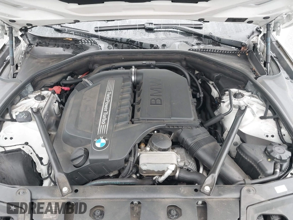 2014 BMW 5 Series 535i with VIN WBA5B1C57ED475963, listed as a IAAI auction lot 41914997 with 92,037 mi miles and . Bid and sale history available at DreamBid. Image 10.