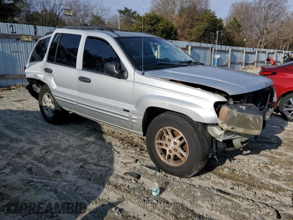 2004 Jeep Grand Cherokee Laredo z VIN 1J4GW48S84C200617, wystawiony jako Copart lot #51732045 z przebiegiem 171 452 mil mil oraz Nie do naprawy • Non repairable. Historia ofert i sprzedaży dostępna na DreamBid. Obrazek 4.