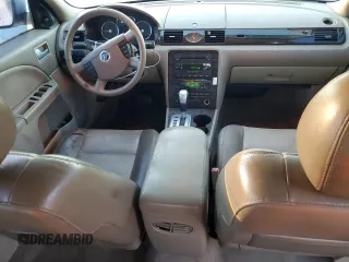 2005 Mercury Montego Luxury z VIN 1MEFM40195G608644, wystawiony jako Copart lot #83732794 z przebiegiem 231 619 mil mil oraz Szkoda całkowita • Salvage title. Historia ofert i sprzedaży dostępna na DreamBid. Obrazek 8.