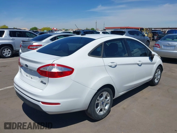 2014 Ford Fiesta SE with VIN 3FADP4BJ0EM172033, listed as a IAAI auction lot 42153874 with 155,640 mi miles. Bid and sale history available at carsss.com. Image 4.