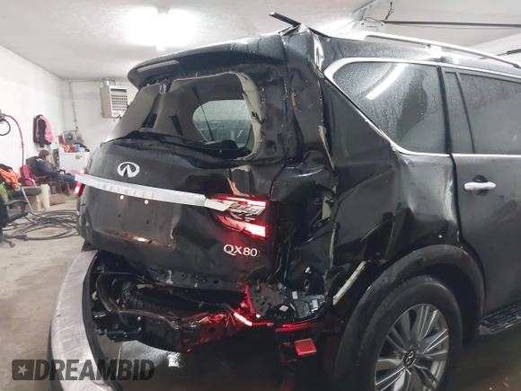 2021 Infiniti QX80 Luxe with VIN JN8AZ2AE7M9271868, listed as a IAAI auction lot 41220686 with 60,782 mi miles and . Bid and sale history available at DreamBid. Image 6.