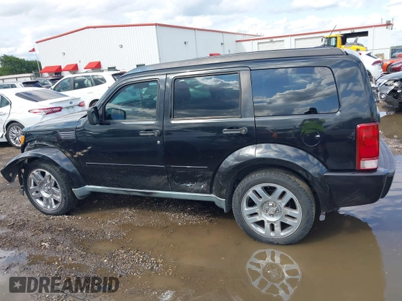 2011 Dodge Nitro Heat with VIN 1D4PT4GK7BW602014, listed as a IAAI auction lot 42371556 with 143,986 mi miles and . Bid and sale history available at DreamBid. Image 14.