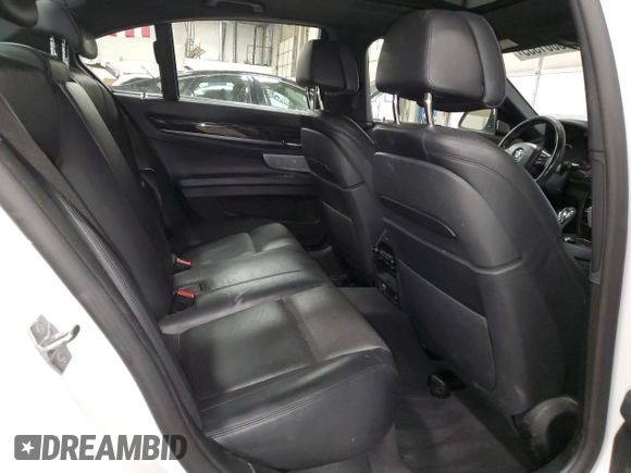 2015 BMW 7 Series 750i xDrive with VIN WBAYB6C54FD965787, listed as a Copart auction lot 89061355 with 104,633 mi miles and Salvage Title. Bid and sale history available at carsss.com. Image 10.