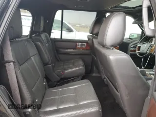 2014 Lincoln Navigator z VIN 5LMJJ2J57EEL02363, wystawiony jako Copart lot #54657415 z przebiegiem 245 326 mil mil oraz Czysty tytuł • Clean title. Historia ofert i sprzedaży dostępna na DreamBid. Obrazek 11.