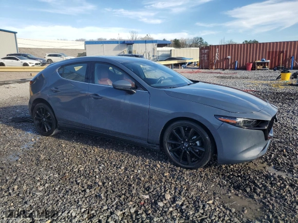 2020 Mazda Mazda3 Hatchback Premium Package with VIN JM1BPANMXL1167843, listed as a Copart auction lot 49596835 with 49,859 mi miles and Salvage Title. Bid and sale history available at carsss.com. Image 4.