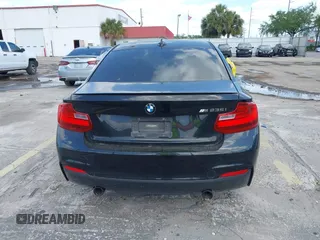 2014 BMW 2 Series M235i with VIN WBA1J7C50EVW84072, listed as a IAAI auction lot 41917841 with 102,745 mi miles and . Bid and sale history available at carsss.com. Image 16.