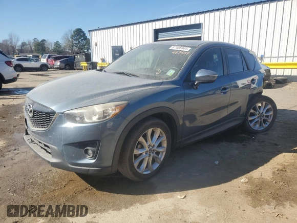 2015 Mazda CX-5 Grand Touring with VIN JM3KE2DY9F0483509, listed as a Copart auction lot 87406944 with 176,213 mi miles and Salvage Title. Bid and sale history available at carsss.com. Image 1.