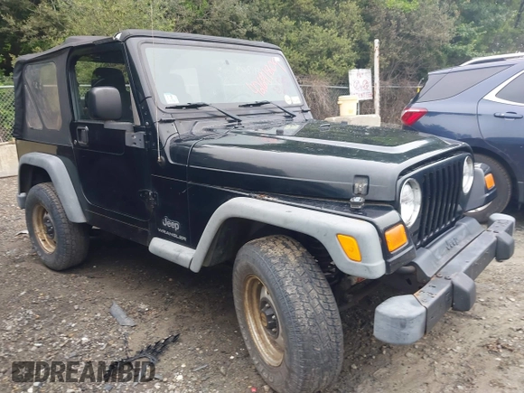 2004 Jeep Wrangler SE with VIN 1J4FA291X4P800973, listed as a IAAI auction lot 42691809 with 116,942 mi miles and . Bid and sale history available at DreamBid. Image 1.