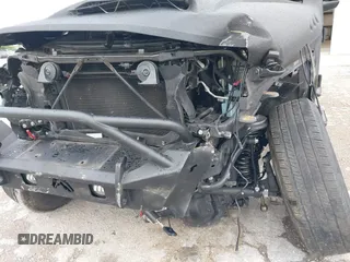 2021 Jeep Gladiator Sport S z VIN 1C6JJTAG9ML604950, wystawiony jako IAAI lot #39912720 z przebiegiem 34 640 mil mil oraz . Historia ofert i sprzedaży dostępna na DreamBid. Obrazek 6.