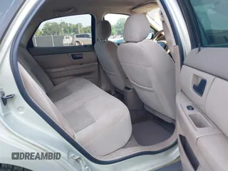 2005 Ford Taurus SE with VIN 1FAFP53205A131307, listed as a IAAI auction lot 42678385 with 198,491 mi miles and . Bid and sale history available at DreamBid. Image 8.