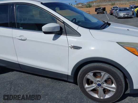 2014 Ford Escape SE with VIN 1FMCU9GX0EUD05633, listed as a IAAI auction lot 41582757 with 103,729 mi miles. Bid and sale history available at carsss.com. Image 6.