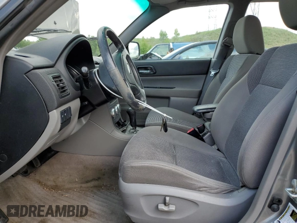 2006 Subaru Forester X with VIN JF1SG65656H709849, listed as a Copart auction lot 59811325 with 198,659 mi miles and Salvage title. Bid and sale history available at DreamBid. Image 7.