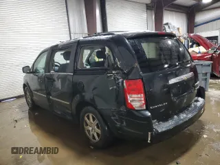 2009 Chrysler Town & Country Touring with VIN 2A8HR54169R665716, listed as a Copart auction lot 87646945 with 152,563 mi miles and Salvage Title. Bid and sale history available at DreamBid. Image 2.