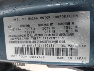 2014 Mazda 3 i Grand Touring with VIN JM1BM1W74E1169186, listed as a IAAI auction lot 41718063 with 113,022 mi miles and . Bid and sale history available at carsss.com. Image 9.