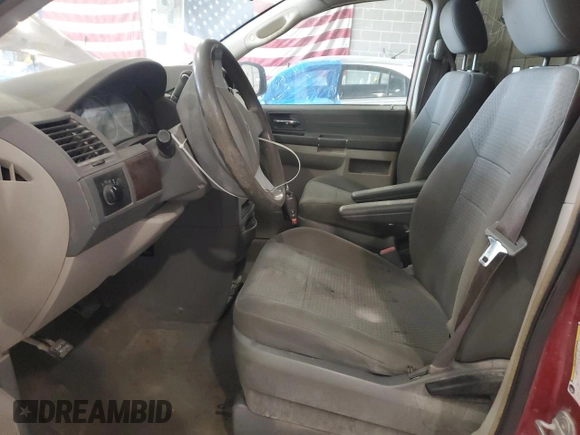 2010 Chrysler Town & Country LX with VIN 2A4RR4DE6AR198174, listed as a Copart auction lot 50757005 with 211,130 mi miles and Salvage Title. Bid and sale history available at DreamBid. Image 7.