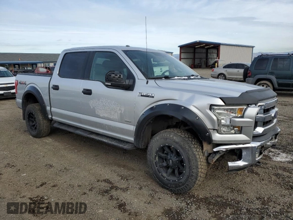 2015 Ford F-150 XLT with VIN 1FTEW1EG1FFA90068, listed as a Copart auction lot 84421594 with 150,386 mi miles and Salvage title. Bid and sale history available at DreamBid. Image 4.