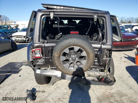 2019 Jeep Wrangler Unlimited Sahara with VIN 1C4HJXEG7KW637630, listed as a Copart auction lot 87192764 with 52,301 mi miles and Salvage Title. Bid and sale history available at carsss.com. Image 6.