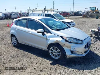 2019 Ford Fiesta SE z VIN 3FADP4EJ5KM143330, wystawiony jako IAAI lot #42096012 z przebiegiem 82 981 mil mil oraz . Historia ofert i sprzedaży dostępna na DreamBid. Obrazek 1.