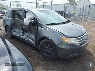 2012 Honda Odyssey EX-L with VIN 5FNRL5H64CB028040, listed as a IAAI auction lot 42126048 with 160,675 mi miles and . Bid and sale history available at DreamBid. Image 1.
