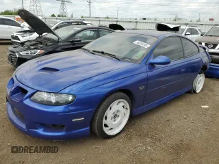 2004 Pontiac GTO z VIN 6G2VX12G04L223636, wystawiony jako Copart lot #56859295 z przebiegiem 183 192 mil mil oraz Szkody całkowita. Historia ofert i sprzedaży dostępna na DreamBid. Obrazek 1.