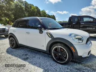 2012 MINI Countryman S with VIN WMWZC5C55CWL57837, listed as a Copart auction lot 63086355 with 81,985 mi miles and Clean title. Bid and sale history available at DreamBid. Image 4.