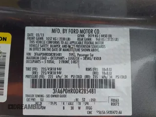 2013 Ford Fusion SE with VIN 3FA6P0HR0DR285481, listed as a IAAI auction lot 42119022 with 128,737 mi miles. Bid and sale history available at carsss.com. Image 9.