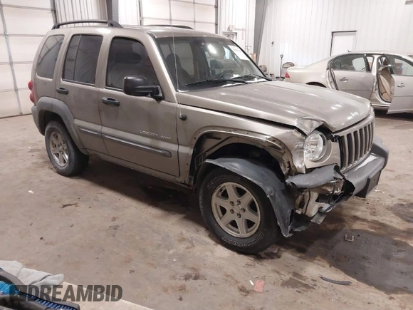 2003 Jeep Liberty Sport with VIN 1J4GL48K83W652993, listed as a IAAI auction lot 41086140 with 115,177 mi miles and . Bid and sale history available at DreamBid. Image 1.