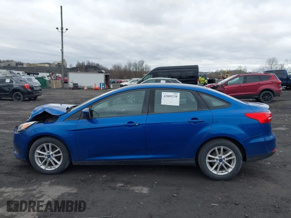 2018 Ford Focus SE z VIN 1FADP3F23JL200674, wystawiony jako IAAI lot #42009238 z przebiegiem 78 007 mil mil oraz . Historia ofert i sprzedaży dostępna na DreamBid. Obrazek 14.
