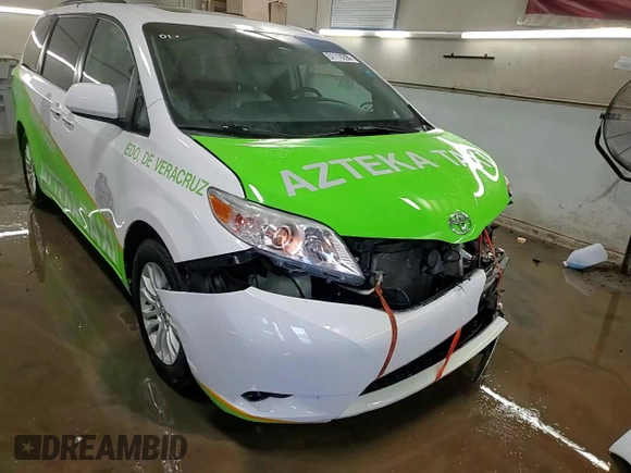 2015 Toyota Sienna XLE с VIN 5TDYK3DC9FS601304, выставлен на аукционе Copart как лот 51118295 с пробегом 153 121 миль миль и Списание • Salvage title. История ставок и продаж доступна на DreamBid. Изображение 14.