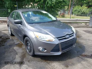 2012 Ford Focus SE with VIN 1FAHP3F22CL125941, listed as a IAAI auction lot 42176898 with 157,940 mi miles and . Bid and sale history available at DreamBid. Image 1.