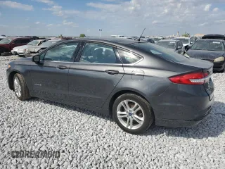 2018 Ford Fusion Hybrid S with VIN 3FA6P0UU8JR145166, listed as a Copart auction lot 71016294 with 54,817 mi miles and Salvage Title. Bid and sale history available at carsss.com. Image 2.
