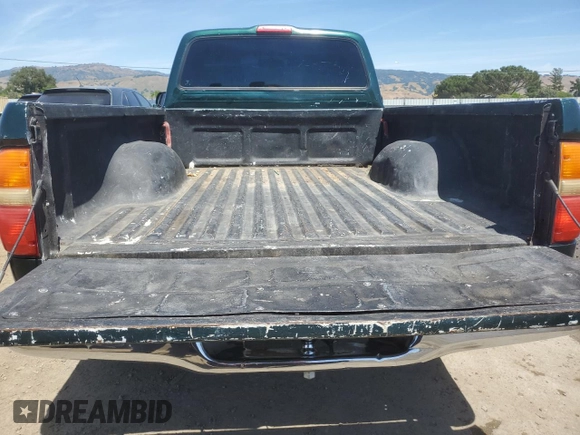 2002 Toyota Tacoma z VIN 5TENL42N72Z110771, wystawiony jako Copart lot #57313875 z przebiegiem 193 343 mil mil oraz Szkoda całkowita • Salvage title. Historia ofert i sprzedaży dostępna na DreamBid. Obrazek 10.