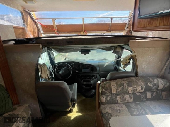 2005 Ford Econoline Cargo z VIN 1FDXE45S45HA87889, wystawiony jako Copart lot #54091985 z przebiegiem 43 302 mil mil oraz Czysty tytuł • Clean title. Historia ofert i sprzedaży dostępna na DreamBid. Obrazek 9.