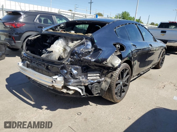 2021 BMW 8 Series M850i with VIN WBAGV8C00MCF55108, listed as a Copart auction lot 56305084 with 27,399 mi miles and Salvage Title. Bid and sale history available at DreamBid. Image 3.