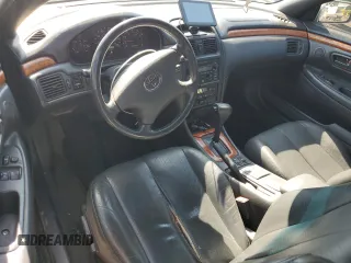 2003 Toyota Solara SE z VIN 2T1FF28P53C610072, wystawiony jako Copart lot #56075605 z przebiegiem 271 457 mil mil oraz Szkoda całkowita • Salvage title. Historia ofert i sprzedaży dostępna na DreamBid. Obrazek 8.
