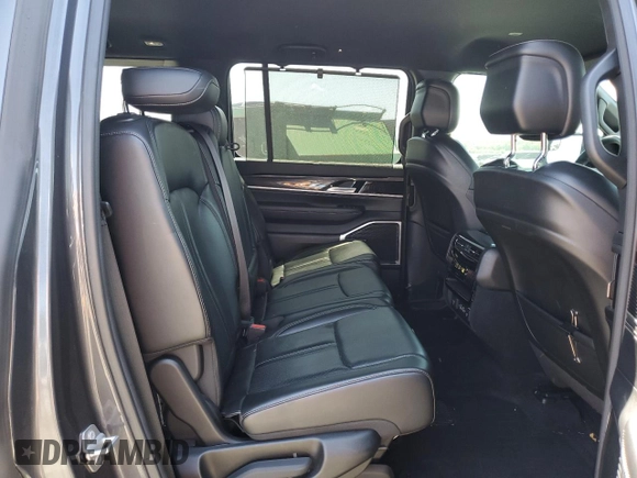 2022 Jeep Grand Wagoneer с VIN 1C4SJUAT9NS202210, выставлен на аукционе Copart как лот 57844125 с пробегом 75 047 миль миль и Списание • Salvage title. История ставок и продаж доступна на DreamBid. Изображение 11.