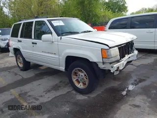 1998 Jeep Grand Cherokee Limited with VIN 1J4GZ78Y2WC164021, listed as a IAAI auction lot 42109012 with 1 mi miles. Bid and sale history available at carsss.com. Image 1.