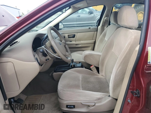 2005 Ford Taurus SE with VIN 1FAFP53205A282454, listed as a Copart auction lot 51052425 with 116,706 mi miles and Salvage Title. Bid and sale history available at carsss.com. Image 7.