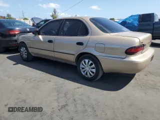 1997 Geo Prizm LSi z VIN 1Y1SK5263VZ408119, wystawiony jako Copart lot #52308235 z przebiegiem 344 971 mil mil oraz Szkody całkowita. Historia ofert i sprzedaży dostępna na DreamBid. Obrazek 2.