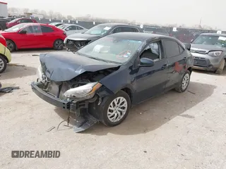 2018 Toyota Corolla L z VIN 5YFBURHE6JP840504, wystawiony jako IAAI lot #41790115 z przebiegiem 83 026 mil mil oraz . Historia ofert i sprzedaży dostępna na DreamBid. Obrazek 16.