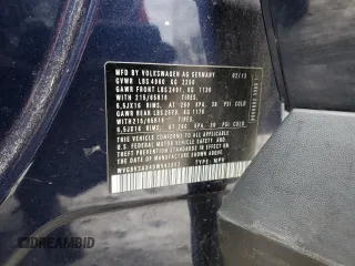 2013 Volkswagen Tiguan SE z VIN WVGBV3AX4DW592802, wystawiony jako Copart lot #47165345 z przebiegiem 124 458 mil mil oraz Szkody całkowita. Historia ofert i sprzedaży dostępna na DreamBid. Obrazek 13.