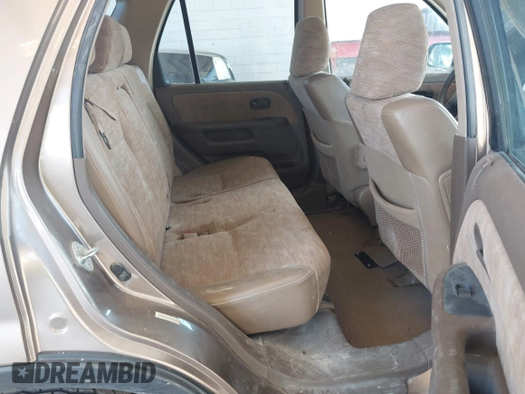 2002 Honda CR-V LX z VIN JHLRD78512C007757, wystawiony jako IAAI lot #41885302 z przebiegiem 177 892 mil mil oraz . Historia ofert i sprzedaży dostępna na DreamBid. Obrazek 8.