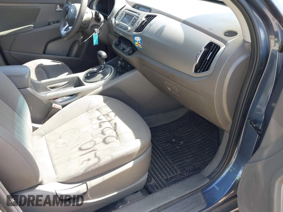 2013 Kia Sportage LX with VIN KNDPB3A27D7395592, listed as a IAAI auction lot 42102273 with 87,991 mi miles and . Bid and sale history available at DreamBid. Image 5.