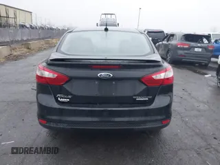 2014 Ford Focus Titanium with VIN 1FADP3J24EL439065, listed as a IAAI auction lot 40868973 with 167,739 mi miles. Bid and sale history available at carsss.com. Image 16.